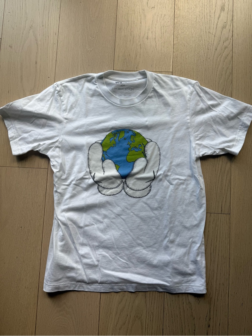 Uniqlo x KAWS “Peace For ALL” White Crewneck Graphic Tee